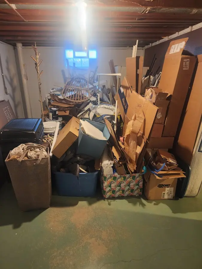 Roll-off dumpster container at job site for 2 Yard Dumpster Rental in Satellite Beach